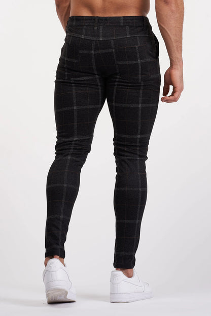 THE IZAYA TROUSERS - ZWART