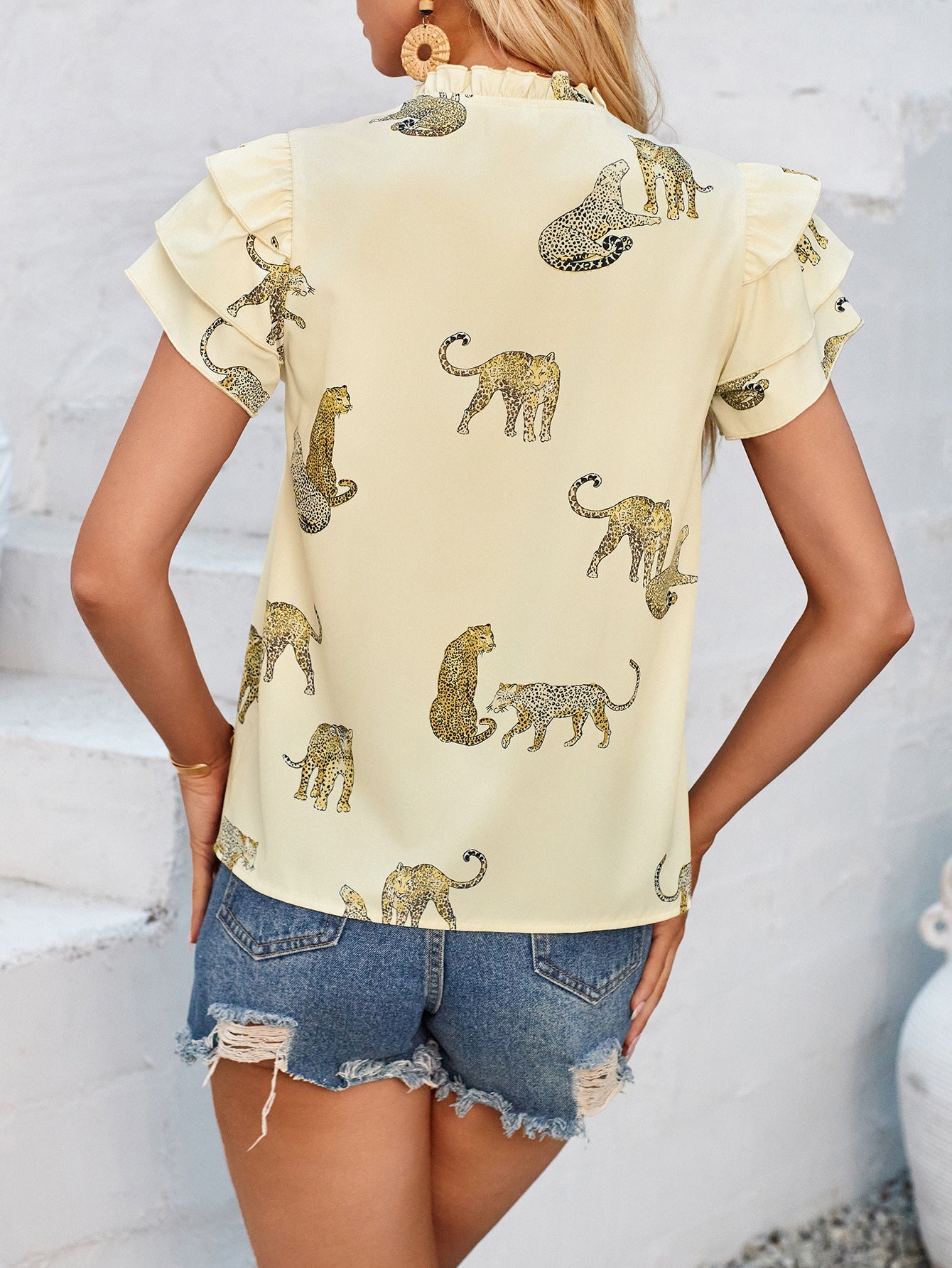 Ruffled Printed Tie Neck Short Sleeve Blouse