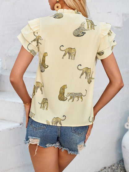 Ruffled Printed Tie Neck Short Sleeve Blouse