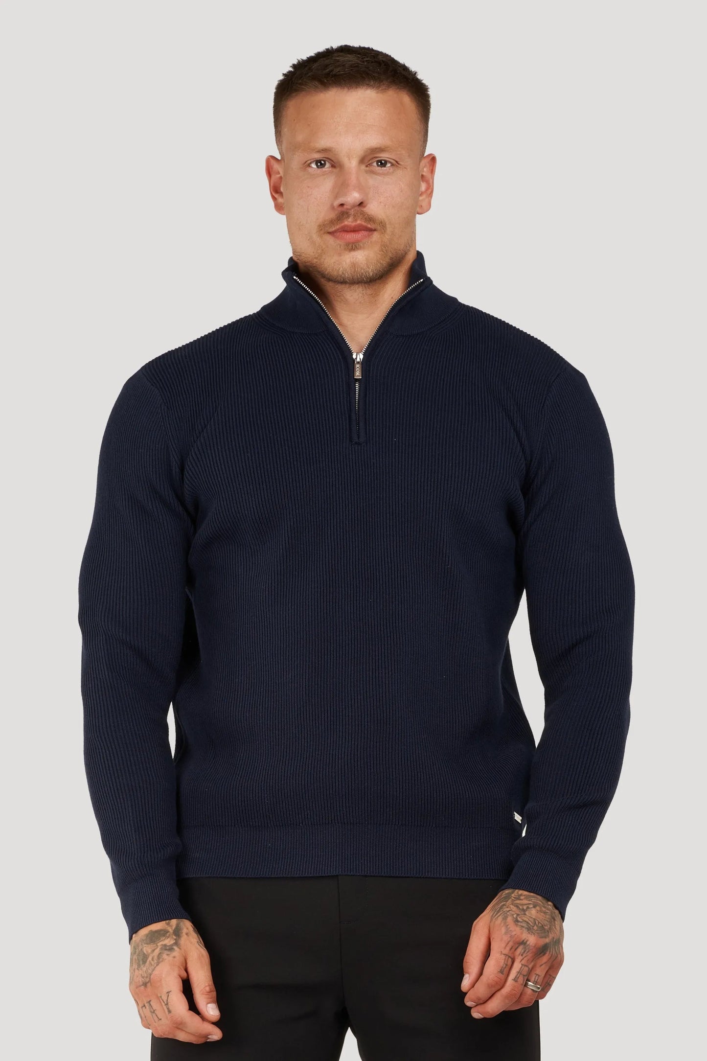 THE RENZO HALF ZIP SWEATER