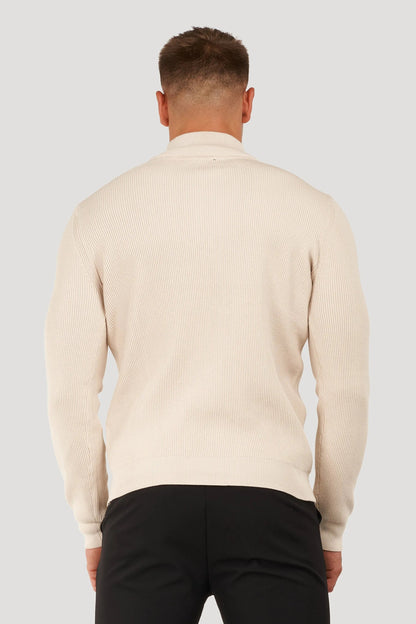 THE RENZO HALF ZIP SWEATER